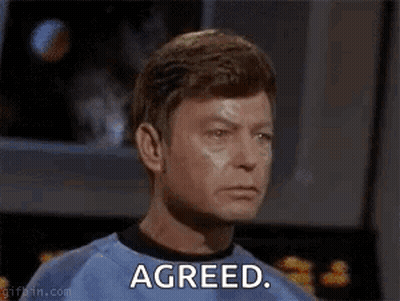 Man In Green Shirt With Agreed Face GIF