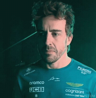 Man In Green Shirt With Aramco JCB And Peroni GIF