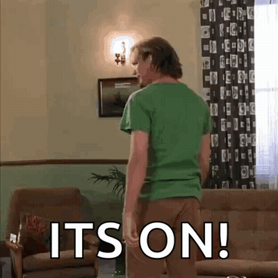 Man In Green Shirt With It's On Floor GIF