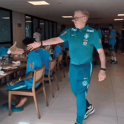 Man In Green Shirt With Itau GIF