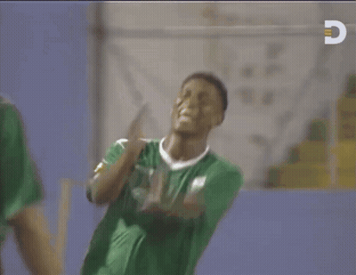 Man In Green Shirt With Letter C GIF
