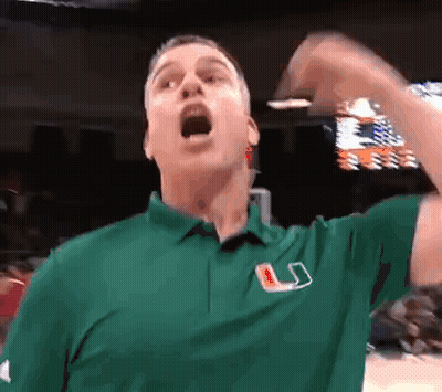 Man In Green Shirt With Letter U Holding Water Bottle GIF