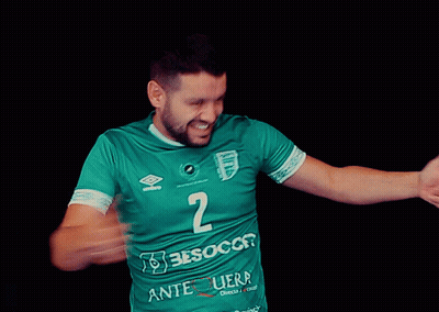 Man In Green Shirt With Number 2 Smiling GIF