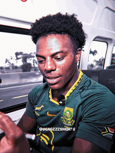 Man In Green South Africa Jersey On Phone GIF