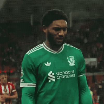Man In Green Standard Chartered Jersey GIF