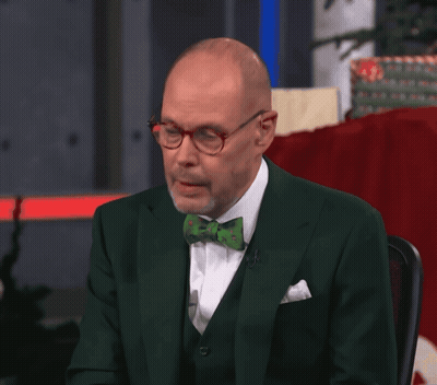 Man In Green Suit And Bow Tie Smiling GIF