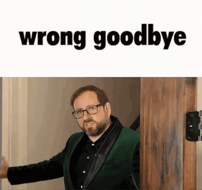Man In Green Suit Glasses Saying Wrong Goodbye GIF