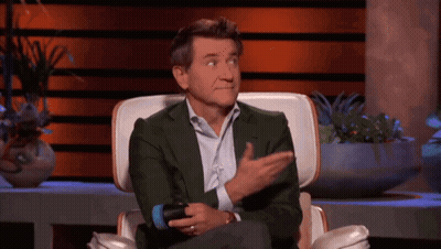 Man In Green Suit Holding Microphone Funny Face GIF