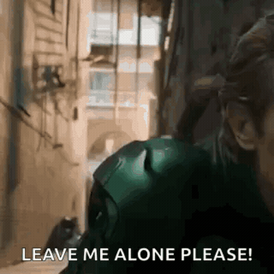 Man in Green Suit Saying Leave Me Alone