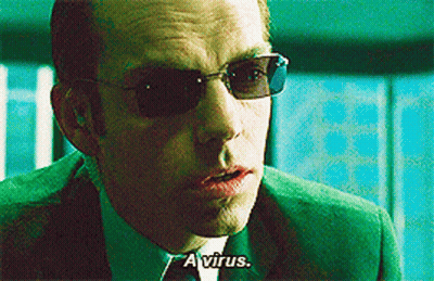 Man In Green Suit Sunglasses Says A Virus GIF
