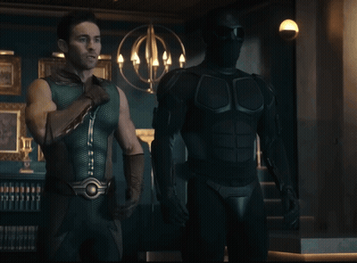 Man In Green Superhero Costume GIF