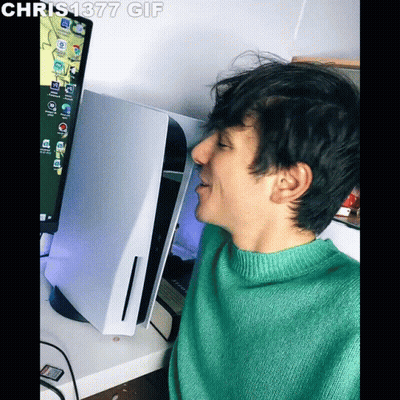 Man In Green Sweater In Front Of Computer Screen Saying Chris1877 GIF