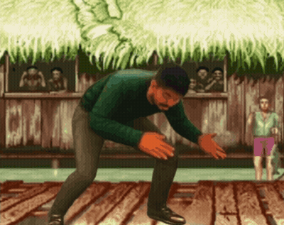 Man In Green Sweater Kneeling GIF