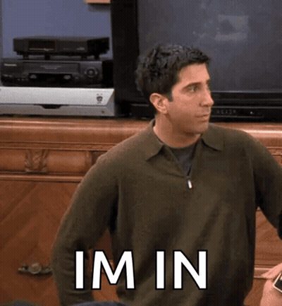 Man In Green Sweater With Im In GIF