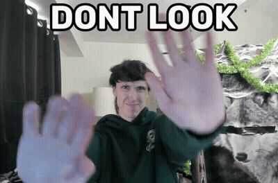 Man In Green Sweatshirt With Wolf Says Dont Look GIF