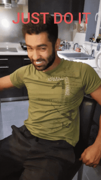 Man In Green T-Shirt Saying Armada Exchange GIF