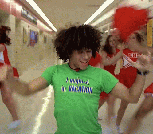 Man In Green T-Shirt Saying I Majored In Vacation GIF