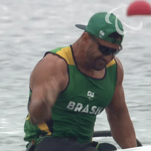 Man In Green Tank Top Saying Brasil GIF