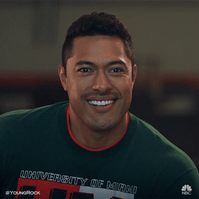 Man In Green University Of Miami Shirt Smiling GIF