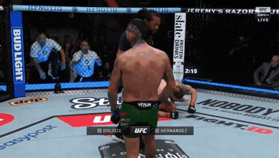 Man In Green Venom Shorts Boxing Another Man GIF