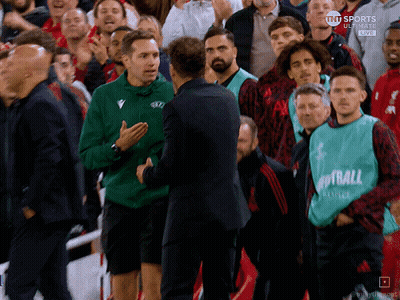 Man In Green Vest Saying Football GIF