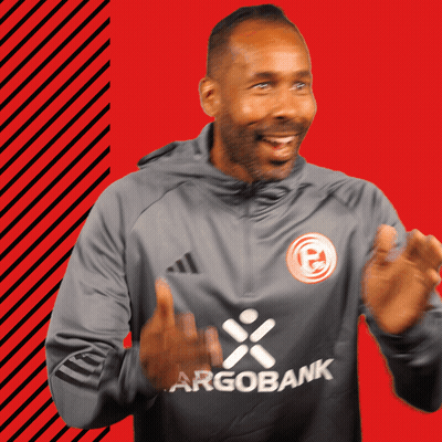 Man In Grey Argobank Shirt Clapping GIF