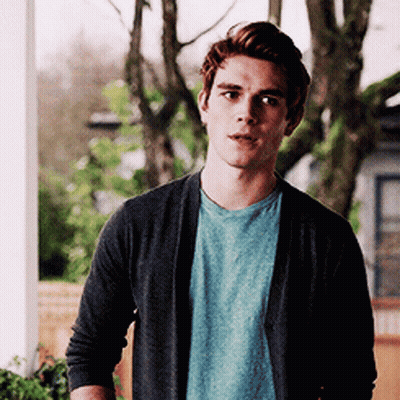 Man In Grey Cardigan And Blue Shirt GIF