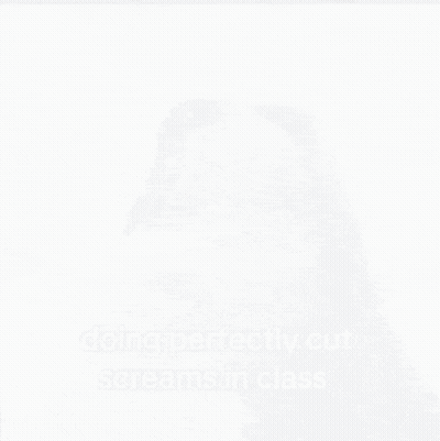 Man In Grey Hoodie Looking At Camera GIF
