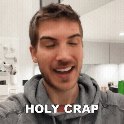 Man In Grey Hoodie Saying Holy Crap GIF