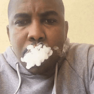 Man In Grey Hoodie Smoking Cigarette GIF