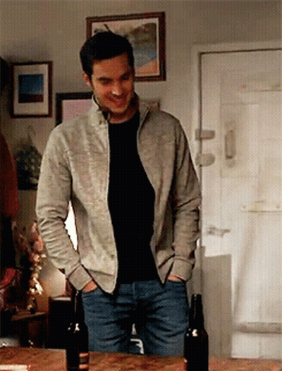 Man In Grey Jacket With Two Beers GIF