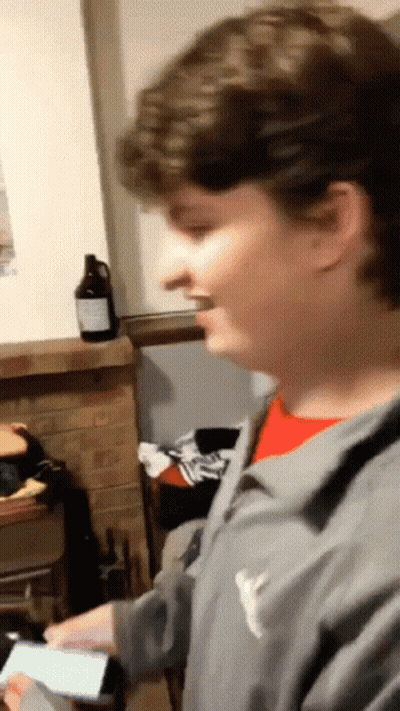 Man In Grey Jacket With Y GIF