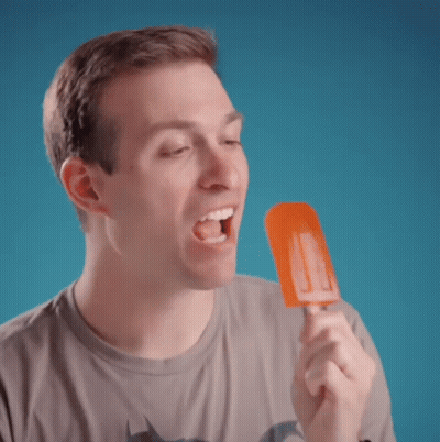 Man In Grey Shirt Eating Popsicle GIF