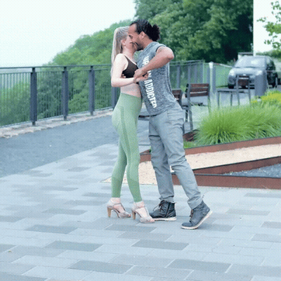 Man In Grey Shirt 'I Am Addicted' Kissing Woman GIF