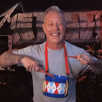 Man In Grey Shirt Playing Small Blue Drum GIF