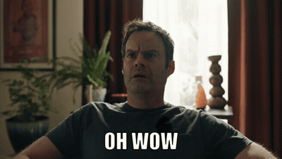 Man In Grey Shirt Saying Oh Wow GIF