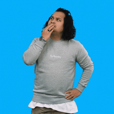 Man In Grey Spooky Sweatshirt Pointing Up GIF