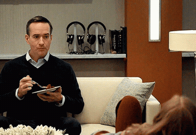 Man In Grey Sweater And Black Pants Sitting GIF