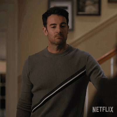 Man In Grey Sweater Asking What Are You Doing Here GIF