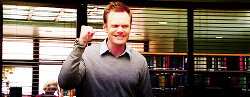 Man In Grey Sweater Fist Pump GIF