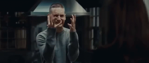 Man In Grey Sweater In Kitchen GIF
