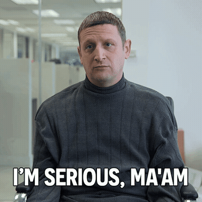 Man In Grey Sweater Saying Im Serious Ma'am GIF