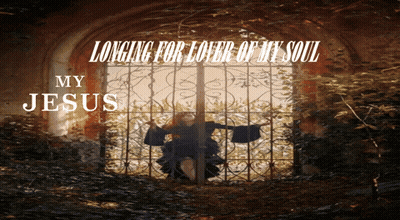 Man In Grey Sweater Sitting Next To Woman In Hallmark Spring Of Love Ad GIF