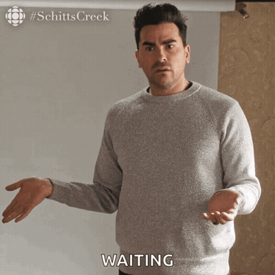 Man In Grey Sweater Waiting GIF