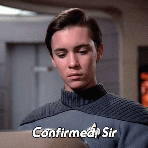Man In Grey Sweater With Confirmed Sir GIF