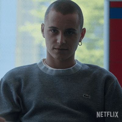 Man In Grey Sweater With Lacoste Logo GIF