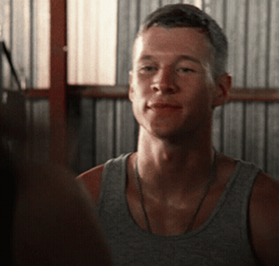 Man In Grey Tank Top Looks At Another GIF