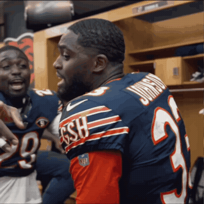 Man In GSH Jersey Talking To Another Man GIF