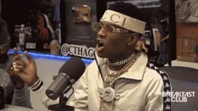 Man In Gucci Headband Singing Into Microphone GIF