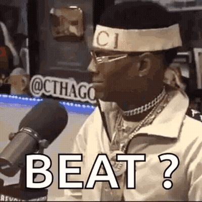 Man In Gucci Headband Talking Into Microphone GIF